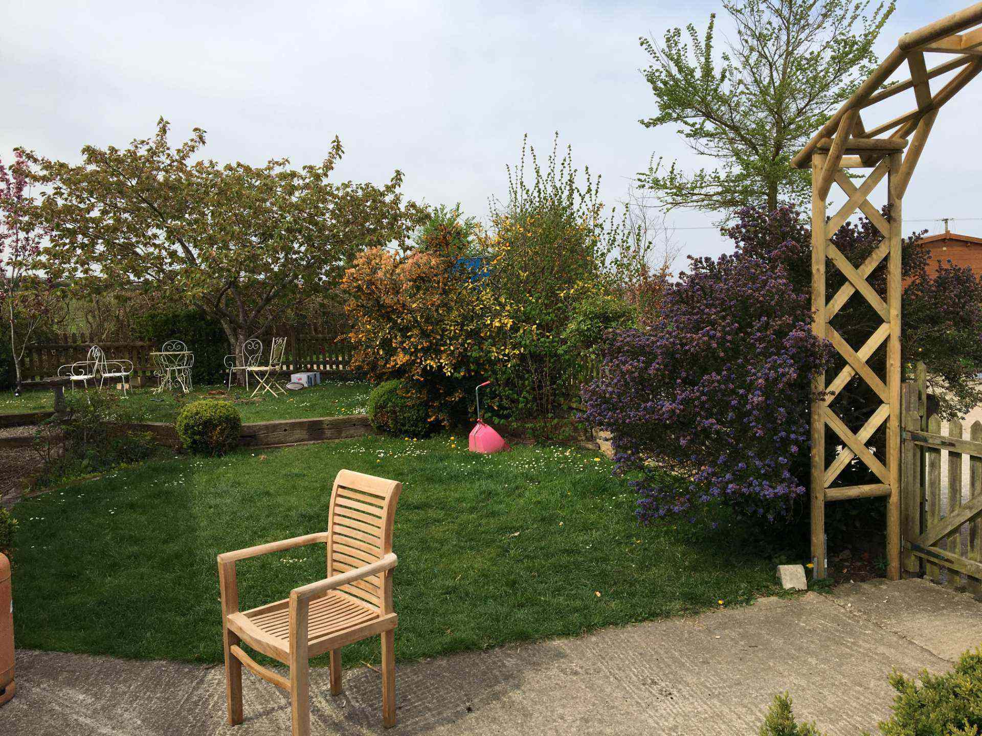 Lush garden with seating areas